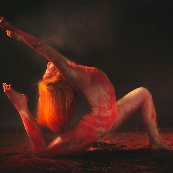 Person in a dynamic yoga pose feeling energetic.